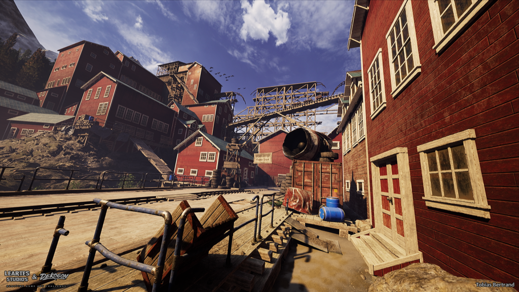 Red mining building exterior with a large rusted industrial vent pipe and suspended ore chute overhead, seen from a wooden walkway with pipe railings